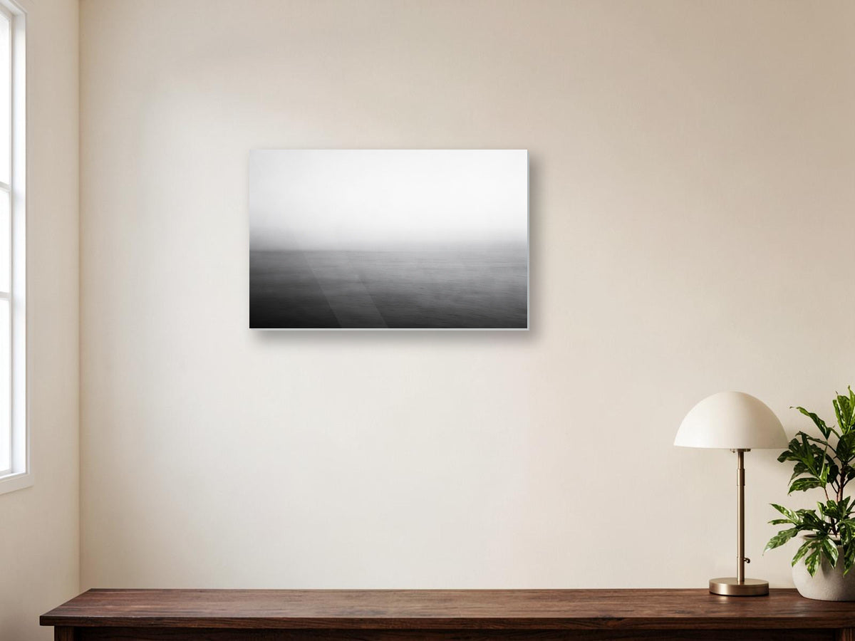 misty landscape metal print displayed in a room