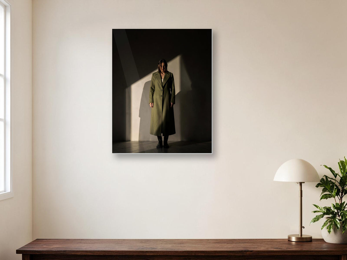 standing figure metal print in an interior