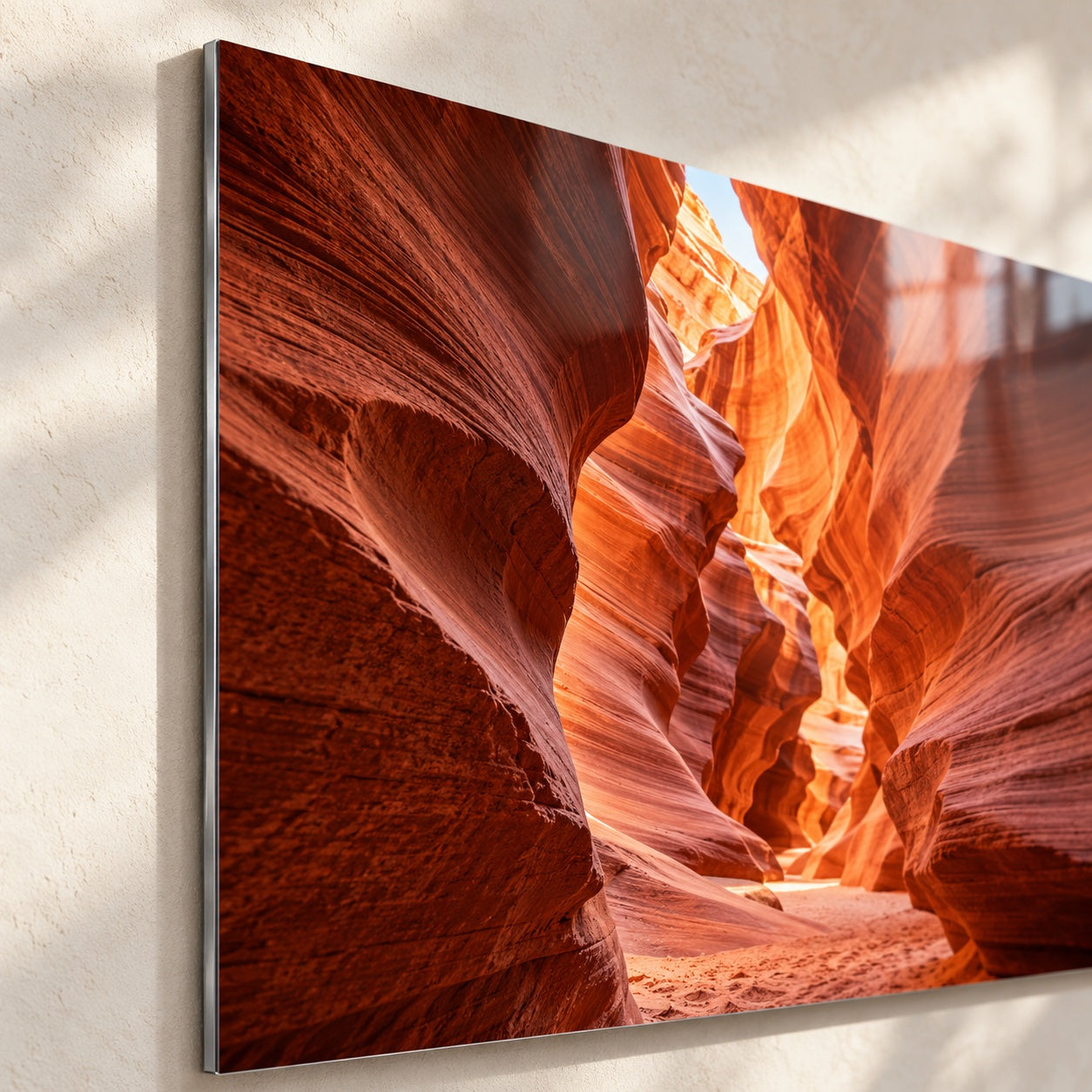 Close view of a canyon metal print showing its thin edge and glossy finish
